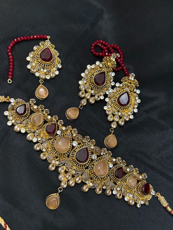 Quzey Kundan Maroon Chokar Set