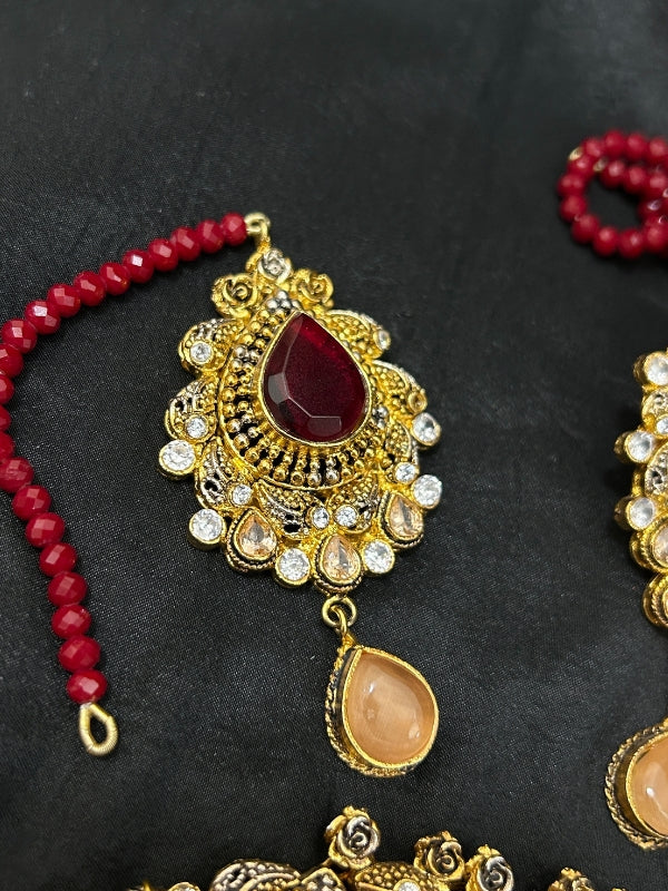 Quzey Kundan Maroon Chokar Set