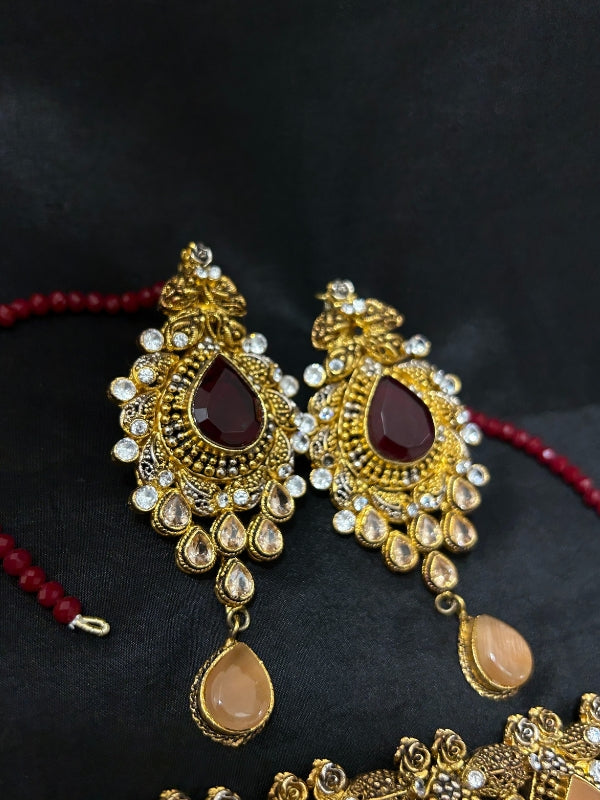 Quzey Kundan Maroon Chokar Set