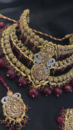 Quzey Maroon Polki Kundan Bridal Set